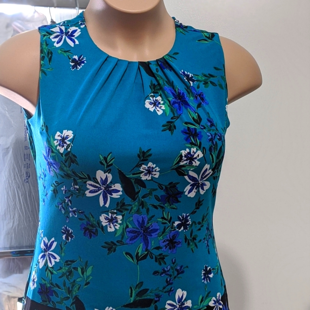 Green blouse with flower print